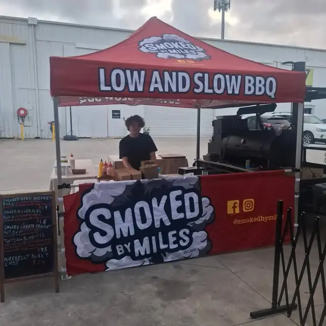 The Smoked by Miles tent set up for service